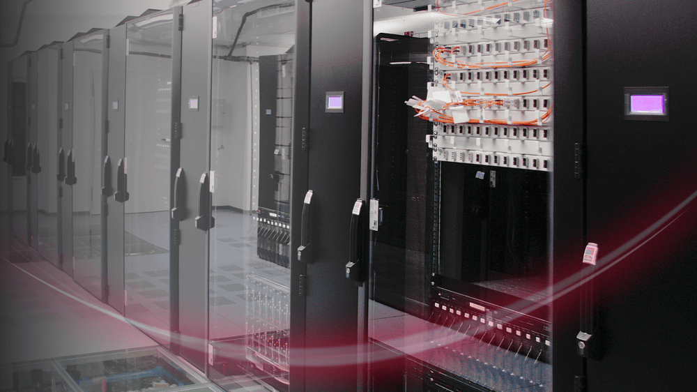 A micro data centre sits with wires connecting to different circuits which is operating to provide essential benefits to operations 