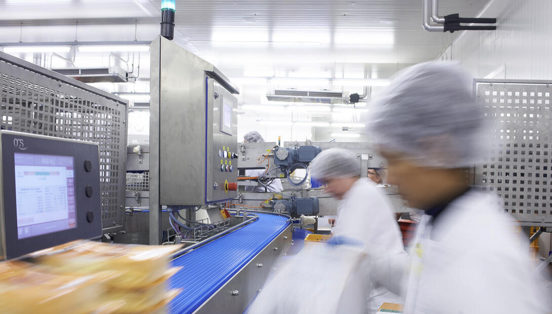 women working in food and beverage processing, fast paced environment